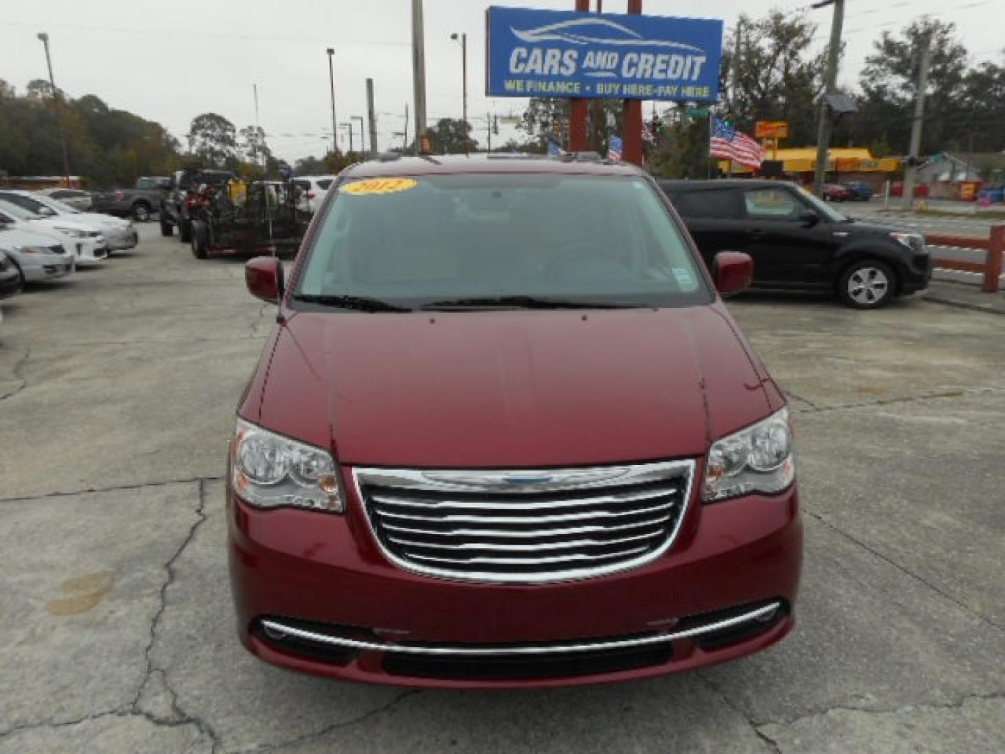 2012 RED CHRYSLER TOWN and COUNTRY TOURI (2C4RC1BGXCR) , located at 10405 Abercorn Street, Savannah, GA, 31419, (912) 921-8965, 31.988262, -81.131760 - Photo#0